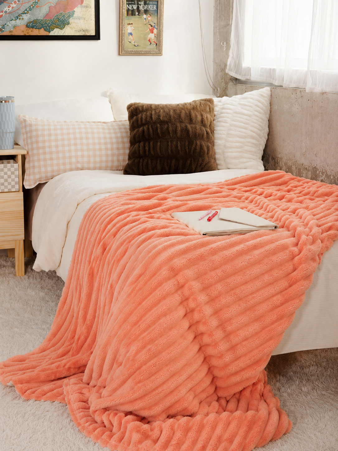 12. MoraNest Orange blanket - styled on bed