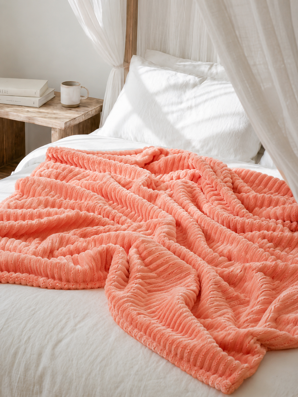 14. MoraNest Orange blanket - texture view on bed