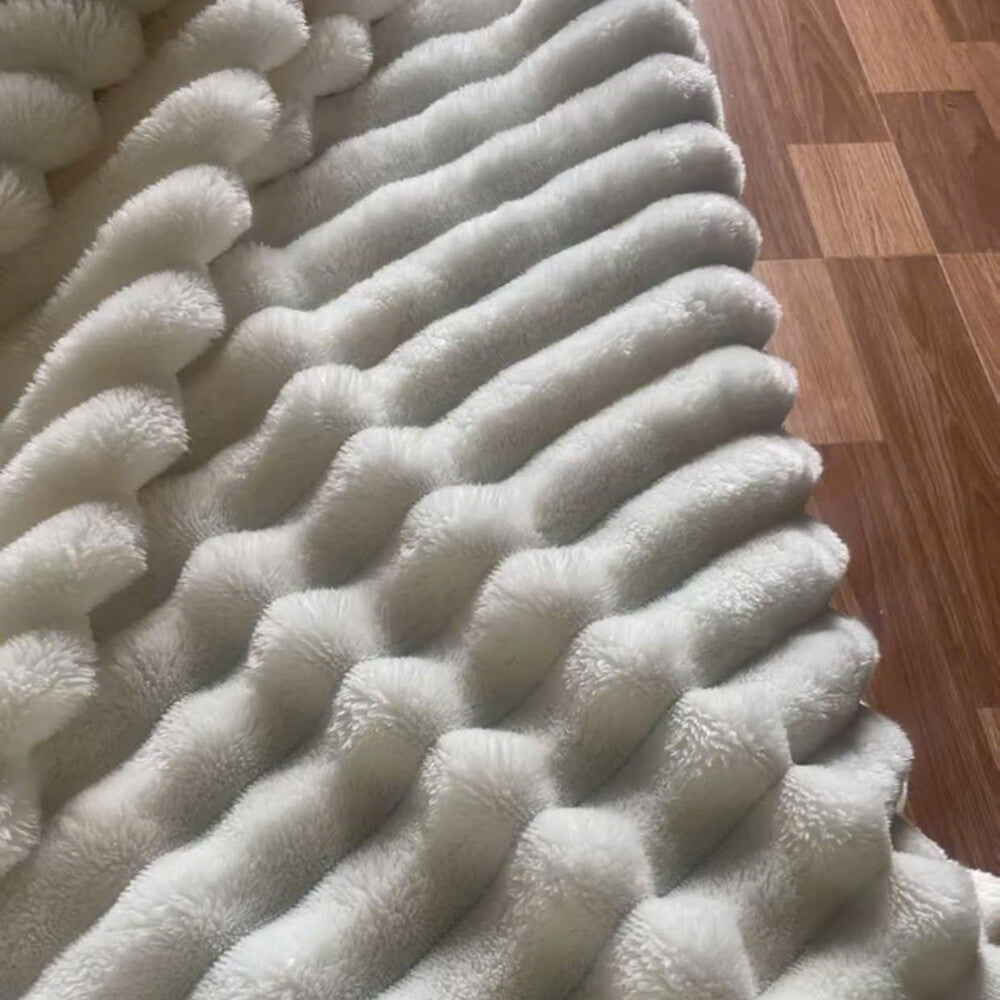 White MoraNest blanket after washing
